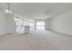 Spacious open-concept living and dining area flowing into the modern kitchen at 130 Club Villas Ln, Kissimmee, FL 34744