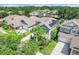 Lovely two-story home with solar panels nestled in a lush, green neighborhood at 13822 Darchance Rd, Windermere, FL 34786