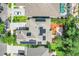 Beautiful home with solar panels and lush landscaping, providing energy efficiency and serene privacy at 13822 Darchance Rd, Windermere, FL 34786