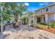 Well-maintained backyard with an outdoor seating area for alfresco dining and relaxation at 13822 Darchance Rd, Windermere, FL 34786