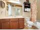Functional bathroom featuring vanity, toilet, and a tub with shower at 13822 Darchance Rd, Windermere, FL 34786