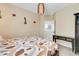 Well-lit bedroom with stylish decor and a view of the hallway at 13822 Darchance Rd, Windermere, FL 34786