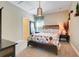 Cozy bedroom with modern decor and unique lighting fixture at 13822 Darchance Rd, Windermere, FL 34786