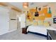 Stylish bedroom featuring unique wall decor and a comfortable bed at 13822 Darchance Rd, Windermere, FL 34786