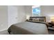 Bedroom featuring a comfortable bed with stylish decor and natural light at 14250 Sapelo Beach Dr, Orlando, FL 32827