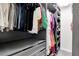 Walk-in closet with ample shelving and drawer space, designed for organized storage at 14250 Sapelo Beach Dr, Orlando, FL 32827