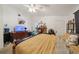 Bedroom with ceiling fan and dresser at 1460 Spring Ridge Cir, Winter Garden, FL 34787