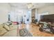 Bright living room with tiled floors and ceiling fan at 1460 Spring Ridge Cir, Winter Garden, FL 34787