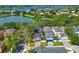 Aerial view of houses near a lake, showing the community's location and neighborhood at 14835 Old Thicket Trce, Winter Garden, FL 34787