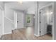 Spacious foyer boasting hardwood floors, natural light, and modern finishes at 14835 Old Thicket Trce, Winter Garden, FL 34787