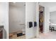 This bathroom includes a toilet, a towel rack, and is attached to a walk-in closet at 150 E Robinson St # 16B-2 1605, Orlando, FL 32801