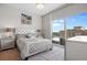 Bright bedroom with city views and a large window at 150 E Robinson St # 16B-2 1605, Orlando, FL 32801