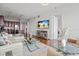 Comfortable living room with modern decor, hardwood floors, and open to the modern kitchen and dining areas at 150 E Robinson St # 16B-2 1605, Orlando, FL 32801