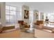 Modern lobby with comfortable seating, elegant art, and large windows offering ample natural light at 150 E Robinson St # 16B-2 1605, Orlando, FL 32801