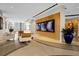 Spacious lobby with sleek seating, large artwork, and modern design for an inviting atmosphere at 150 E Robinson St # 16B-2 1605, Orlando, FL 32801