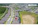 Community aerial view showcasing home with private pool, amenity center and surrounding neighborhood at 15049 Canopy Cover Dr, Winter Garden, FL 34787