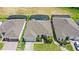 Aerial view of a property featuring a private pool with screened enclosure and well-maintained backyard at 15049 Canopy Cover Dr, Winter Garden, FL 34787