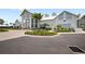 Elegant community clubhouse with modern architectural design, lush landscaping, and ample parking at 15049 Canopy Cover Dr, Winter Garden, FL 34787