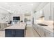 Sleek kitchen with stainless steel appliances and a large island at 15049 Canopy Cover Dr, Winter Garden, FL 34787