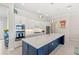Bright and stylish kitchen featuring modern appliances and a large center island at 15049 Canopy Cover Dr, Winter Garden, FL 34787