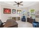 Office featuring a desk, cabinet, sports memorabilia, and comfortable seating at 15049 Canopy Cover Dr, Winter Garden, FL 34787
