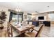 Dining area flowing to the outdoor patio and into the living room at 1520 Mulligan Blvd, Davenport, FL 33896