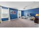 Spacious game room with ample seating, perfect for entertainment and relaxation at 1520 Mulligan Blvd, Davenport, FL 33896
