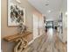 Elegant hallway features stylish decor and beautiful tile flooring at 1520 Mulligan Blvd, Davenport, FL 33896