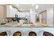 Modern kitchen with stainless steel appliances, granite countertops and bar seating at 1520 Mulligan Blvd, Davenport, FL 33896