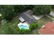 Picture of a home showcasing the backyard pool and patio area with an overhead, bird's eye view at 1525 Jaguar Cir, Apopka, FL 32712