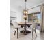 Cozy breakfast nook features a round table with seating and sliding doors at 15356 White Tail Loop, Mascotte, FL 34753