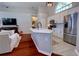 Open-concept kitchen with an island bar and stainless appliances is ideal for entertaining, flowing seamlessly into living areas at 1676 Bear Crossing Cir, Apopka, FL 32703