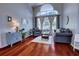 Cozy living room features hardwood floors and high ceilings with lots of light at 1676 Bear Crossing Cir, Apopka, FL 32703