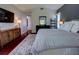 Tastefully decorated main bedroom with a large bed, dresser, and plenty of space for relaxation and personal style at 1676 Bear Crossing Cir, Apopka, FL 32703