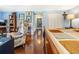 Spacious bedroom with hardwood floors, natural light, and ample closet space for organized storage at 1919 E South St, Orlando, FL 32801