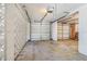 Spacious two-car garage with cinder block walls, garage door openers, and concrete floors at 1919 E South St, Orlando, FL 32801