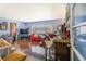 Spacious living room with hardwood floors, plenty of seating, and stylish decor, perfect for entertaining at 1919 E South St, Orlando, FL 32801