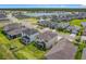 Neighborhood aerial featuring stunning water views, community landscaping, and sidewalks at 200 Azure Mist Way, Daytona Beach, FL 32124