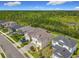 Landscaped home with brick driveway backing to a nature preserve at 200 Azure Mist Way, Daytona Beach, FL 32124
