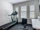 Exercise room with treadmill and weights provides a convenient space for staying active at 200 Azure Mist Way, Daytona Beach, FL 32124