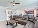 Open-concept living room connecting to the kitchen and foyer, perfect for modern living at 200 Azure Mist Way, Daytona Beach, FL 32124
