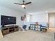 Second-floor playroom with a ceiling fan, TV, and playroom furnishings at 200 Azure Mist Way, Daytona Beach, FL 32124