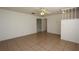 Bright living room featuring tiled flooring, neutral paint, and natural light at 2013 Dearing Ave, Deltona, FL 32725