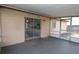 Covered patio with sliding glass door access to the house at 2013 Dearing Ave, Deltona, FL 32725