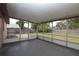 Screened patio offers view of fenced backyard at 2013 Dearing Ave, Deltona, FL 32725