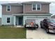 Charming two-story home featuring a spacious front yard and attached garage at 268 Fiddlewood Ct, Davenport, FL 33837