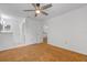 Bedroom with ceiling fan and en-suite bathroom at 2750 King Oak Cir, St Cloud, FL 34769