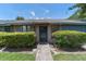 Charming single-story home features brick accents, mature landscaping, and a welcoming entrance at 2750 King Oak Cir, St Cloud, FL 34769