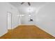 Spacious living room with vaulted ceilings, neutral tones, carpet flooring, and bright natural light at 2750 King Oak Cir, St Cloud, FL 34769