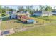 A fenced yard featuring a multi-level deck with outdoor seating and an above ground pool creating the perfect backyard retreat at 2801 Sw 139Th St, Ocala, FL 34473